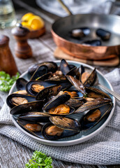 Delicious Blue Mussels on a Rustic Table Top