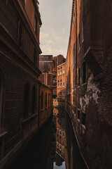 a narrow canal in beautiful Venice