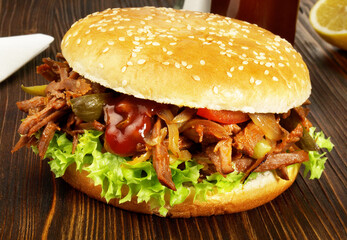 Pulled Beef Hamburger - Fast Food on wooden Background