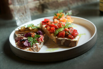 Assorted bruschetta on a plate