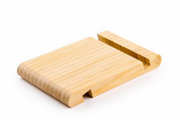 bamboo phone stand on a white isolated background