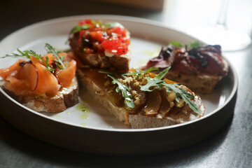 Assorted bruschetta on a plate