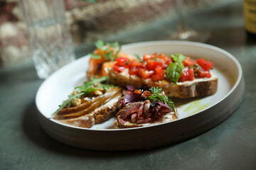 Assorted bruschetta on a plate
