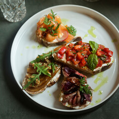 Assorted bruschetta on a plate