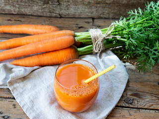 Fresh squeezed vegetable smoothie juice carrot in a glass. Healthy eating, detox, dieting. 
