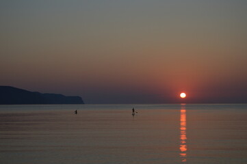 Early Morning in Pollensa Bay  
Sunrise mood Paddle surf  
Canon D3200
Blue clear sky with sun in front of