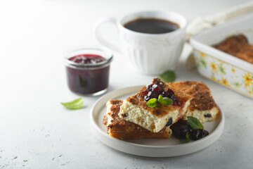 Traditional homemade cottage cheese pie with cherry sauce
