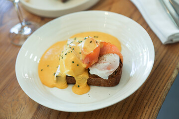 Traditional Benedict eggs with smoked salmon