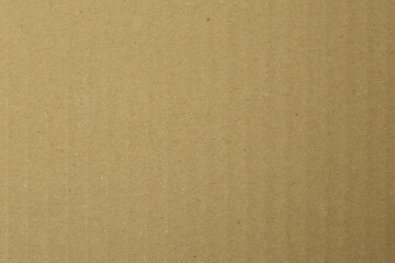 Corrugated cardboard box with vertically running line structure photographed in top view