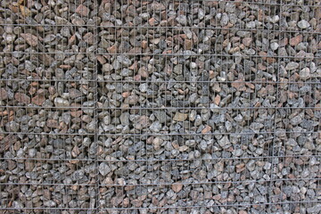 Wall made of fine gravel. Macro. Russia.