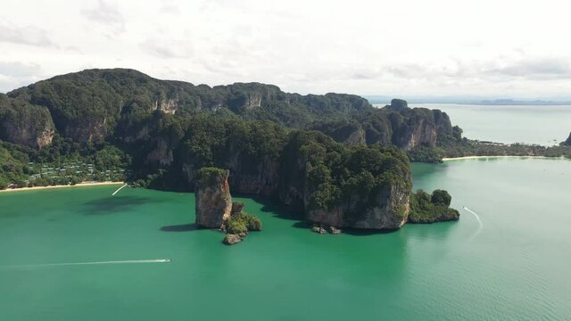 Aerial view of limestone mountains in Railey and Ao Nang beach at krabi province, Thailand, one of the most popular island in Andaman sea. Tourism, Travel destination and summer vacation concept.