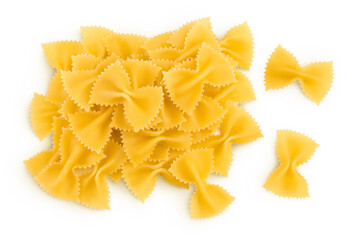 Bow tie pasta isolated on white background with clipping path and full depth of field. Top view. Flat lay.