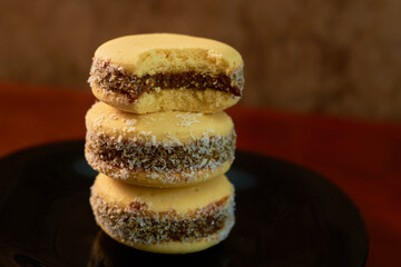 Alfajores made with cornstarch filled with caramel and coconut. Traditional Argentinean pastries.
