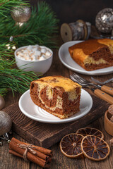 Zebra chocolate cake on a Christmas background.