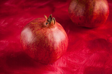 pomegranate on a red background postcard poster wallpaper