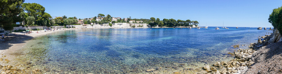 ra wide view of the beautiful Fosses Beach in Saint Jean Cap Ferrat with tropical colored water