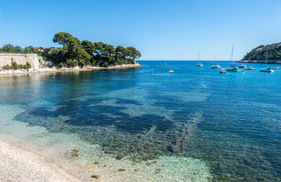 Aerial view of the beautiful Fosses Beach in Saint Jean Cap Ferrat with tropical colored water
