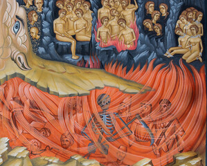 A painting depicting souls of hell,on the wall of the Cormaia monastery - Romania 10.Oct.2021