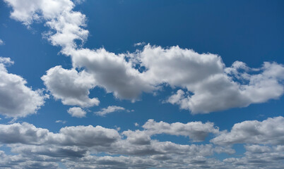 The fluffy fall clouds background