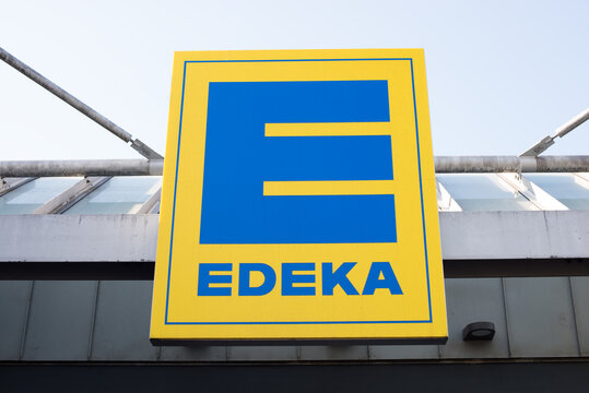 Sign of the supermarket chain Edeka in Trier, Germany, 10.10.2021, brand name