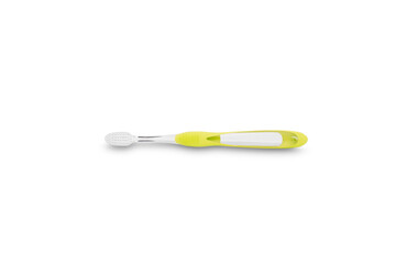 Yellow toothbrush on white background