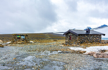Stone cottage Galdhøpiggen Jotunheimen largest highest mountain in Norway Scandinavia.
