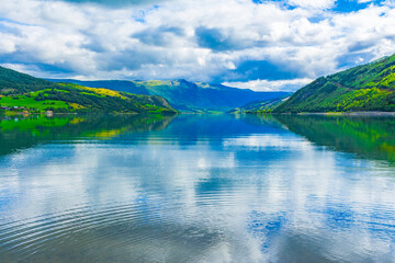 Fototapeta na wymiar Incredible norwegian landscape colorful mountains fjord forests Jotunheimen Norway.