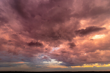 Colorful sunset with clouds in the evening