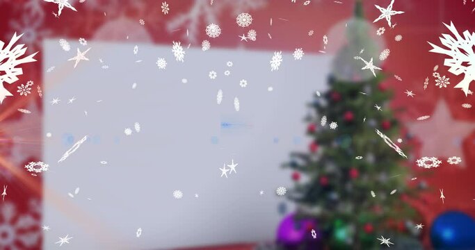 Animation of snow falling over christmas tree on red background