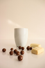 coffee and sweets on a white background. sweets on the table. cookies and coffee on a white background. cannets and cookies on a white background. sweets on the table