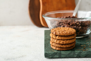 Board with tasty hojicha cookies on table