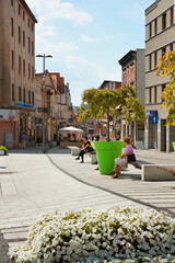 Fototapeta premium Summer cityscape - view of the square and street in the center of Rybnik, the Silesian Voivodeship, in southern Poland