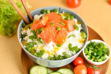 Tasty poke bowl on color background