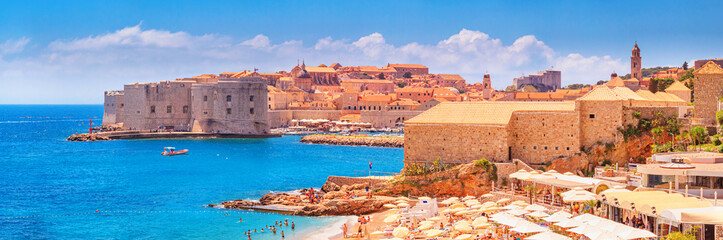 Coastal summer landscape, panorama - view of the city beach on the background of the Old Town of...