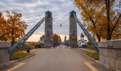City Ostrov  with the famous ancient chain bridges and the Temple on the island - obrazy, fototapety, plakaty