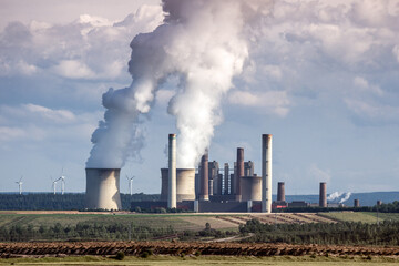 Power plant factory chimney emissions causing air pollution - 462278776