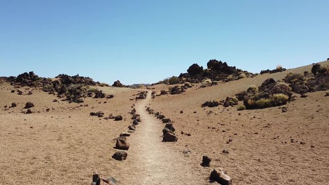 walking on hiking path or trail in desert landscape