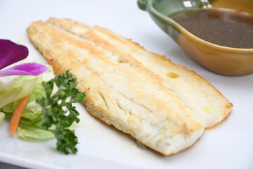 Branzino con salsa curry