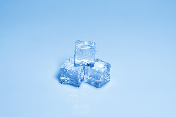 Obraz premium Ice crystal cubes, space for text or design.