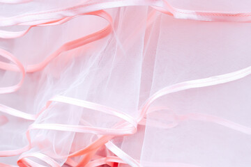 Wedding dress detail. Pink wedding dress frills close up.