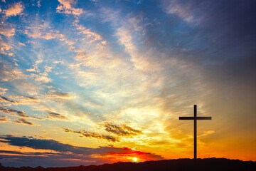 Religious Christian cross with sunset sky