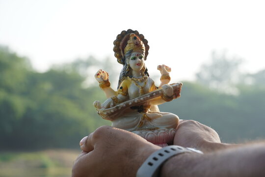 Hindu goddess devi sarswati on hand image