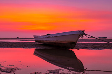 Abandoned Boat at Sunset