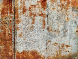 Corroded metal background. Rusty metal background with streaks of rust. Rust stains. Rystycorrosion.