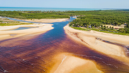 Corumbau, Prado, Bahia. Aerial view of the mouth of the Corumbau River (the meeting of the river and the sea)