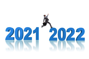 Businessman jumping from year 2021 to 2022