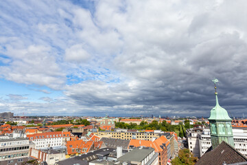 Fototapeta premium Cityscape wide angle view atop the Round Tower in downtown Copenhagen, Denmark.