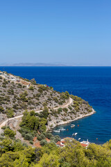 View of the mountains, village and the sea from the cliff (Greece, Peloponnese)