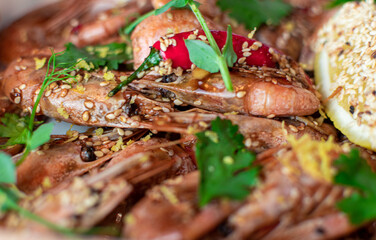 oysters in cream sauce.decorated with black caviar and greens