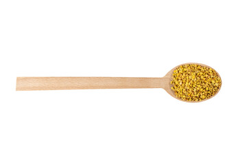 Bee pollen in wooden spoon isolated on white background. Natural herbal medicine